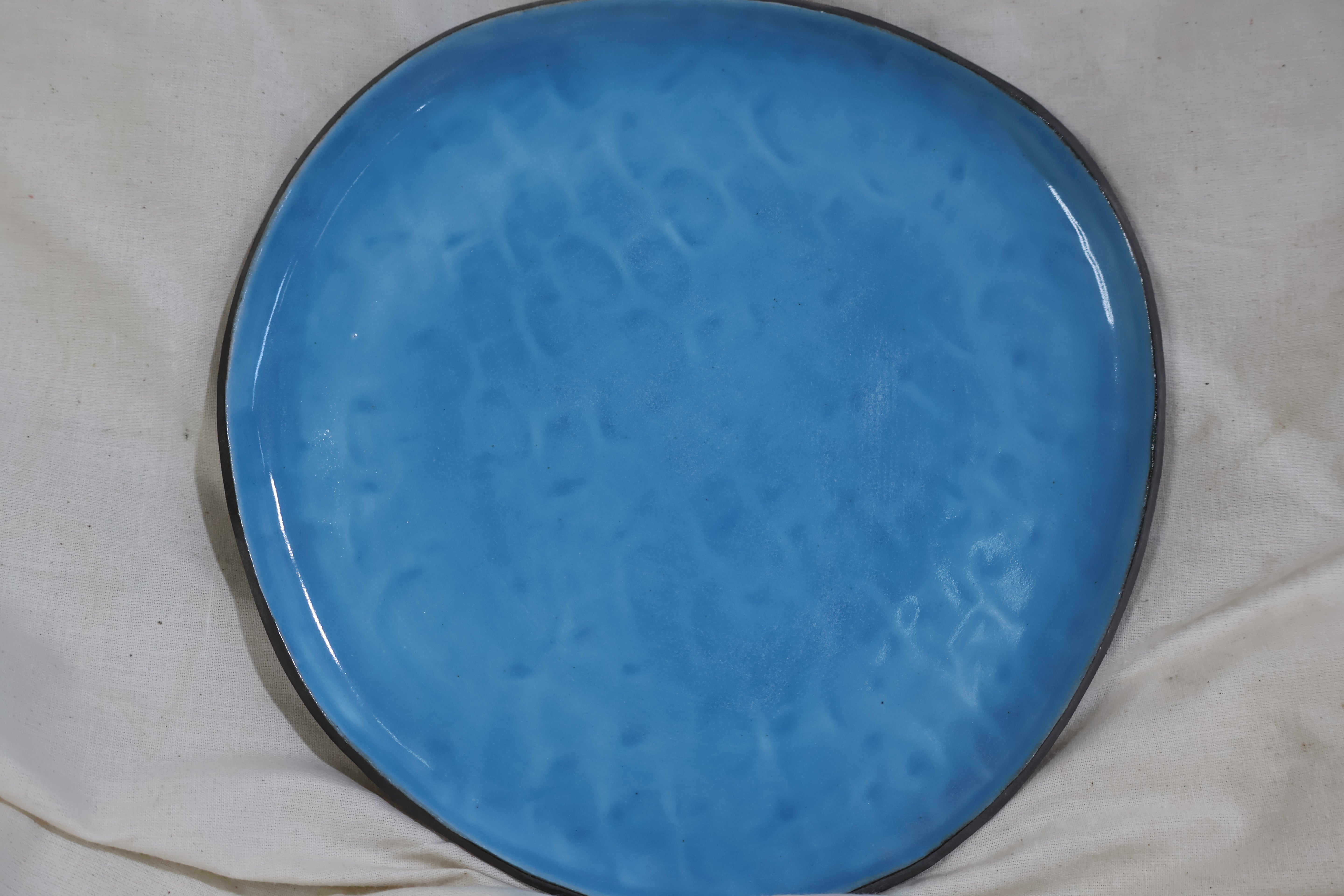 white slip applied over the clay then the glaze